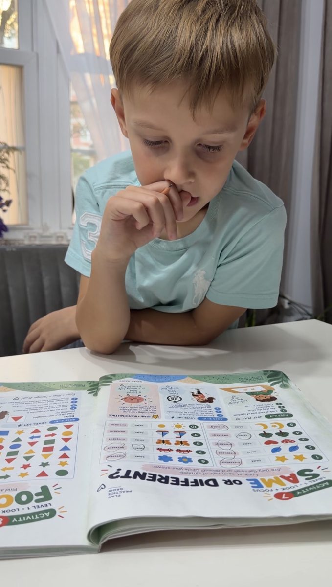 A boy thinks over a Neuro Games puzzle